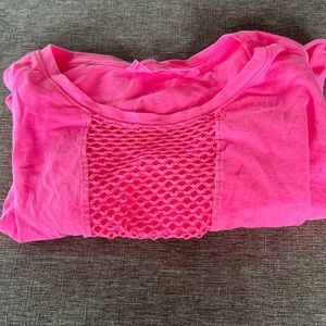Bright pink cropped top